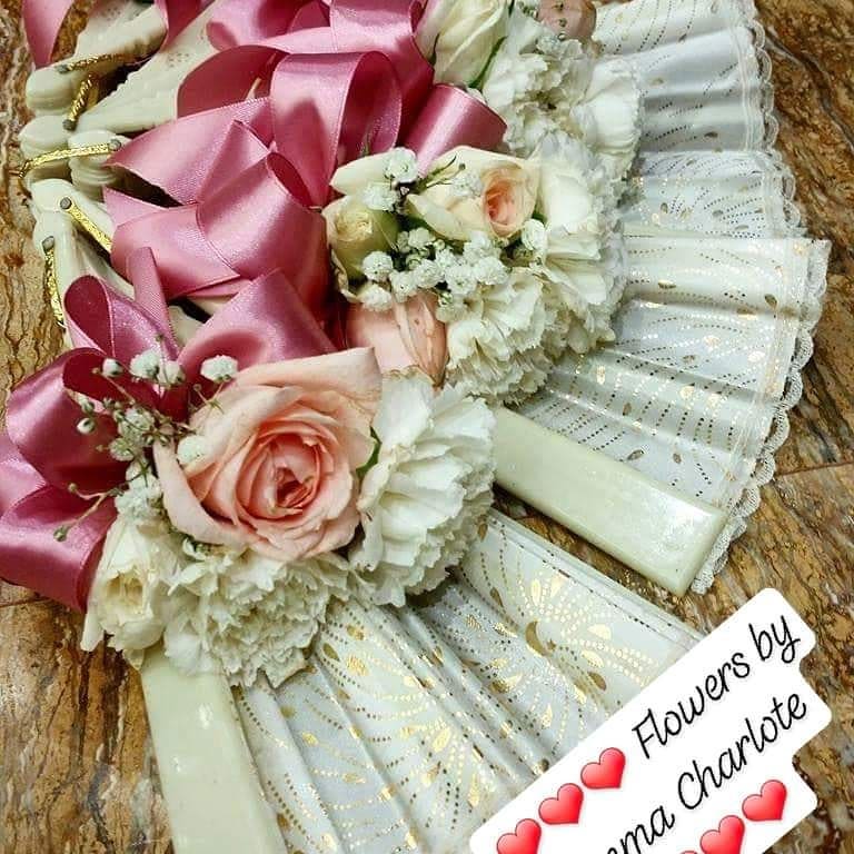 Pink and white floral fan arrangement by Flowers by Emma Charlote