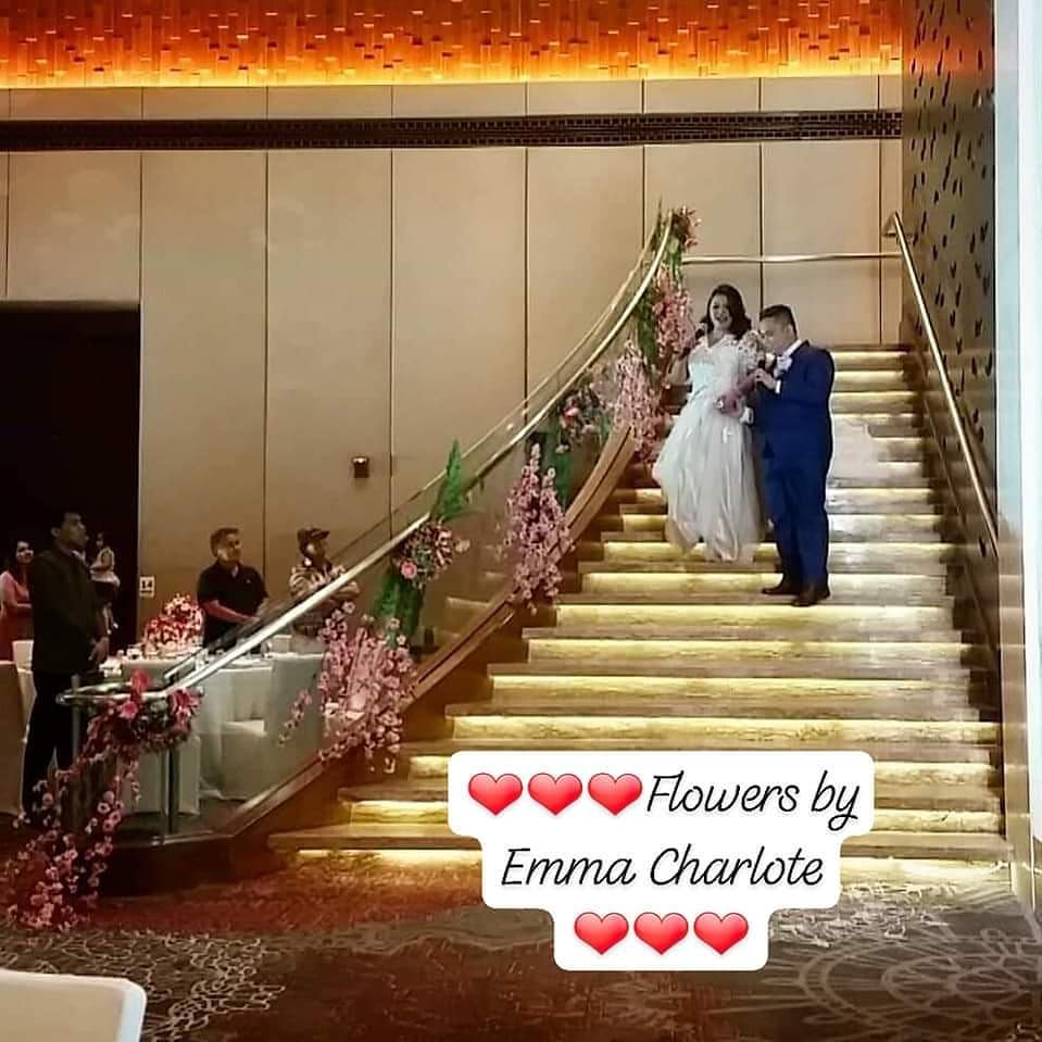 Wedding staircase floral styling by Flowers by Emma Charlote